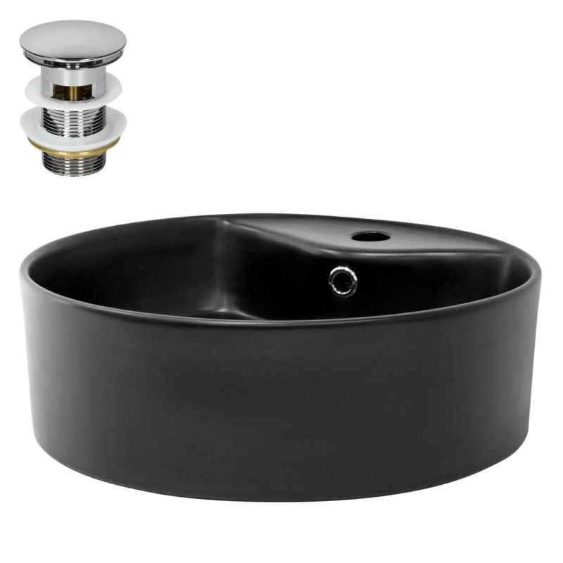 Schwarzes Waschbecken mit Abfluss und Zubehör.